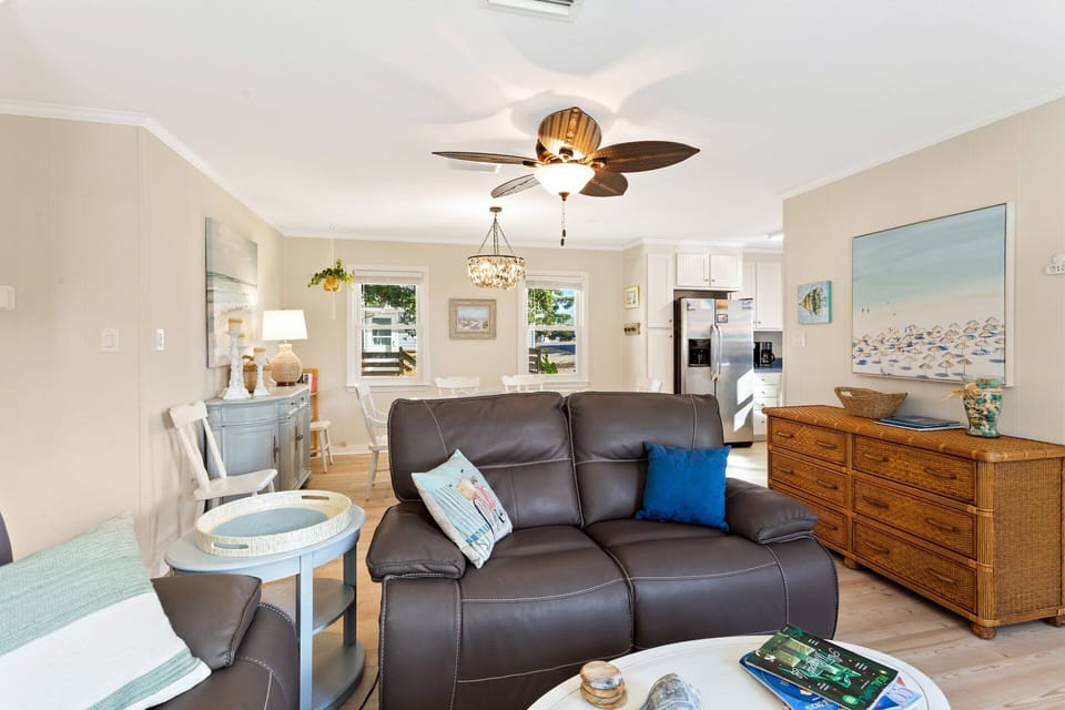 On the Main Level, you'll find a thoughtfully designed layout perfect for unwinding after a day of sun and surf.
