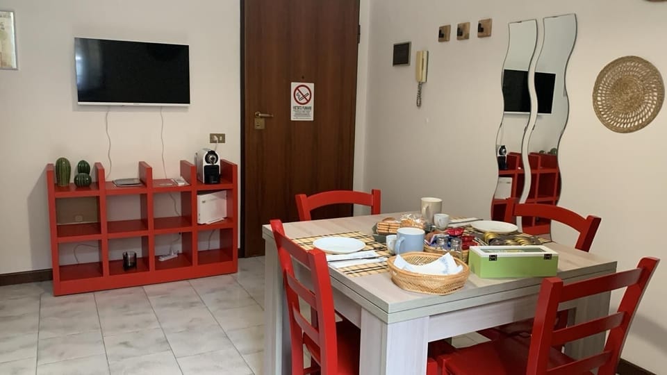 Living area with espresso machine and TV