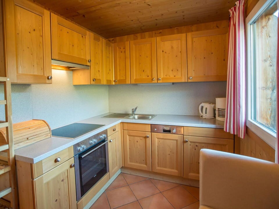 Wood, Interior Design, Flooring, Kitchen, Cabinetry, Floor, Countertop, Ceiling, Room, Wood Stain