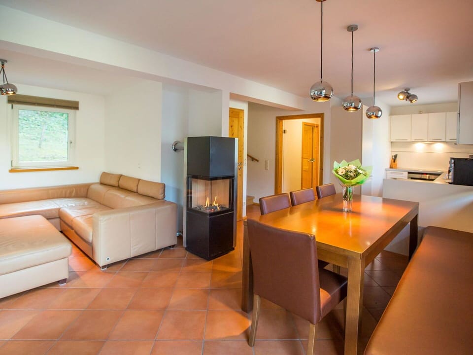 Furniture, Interior Design, Flooring, Floor, Wall, Ceiling, Wood, Couch, Room, Light Fixture