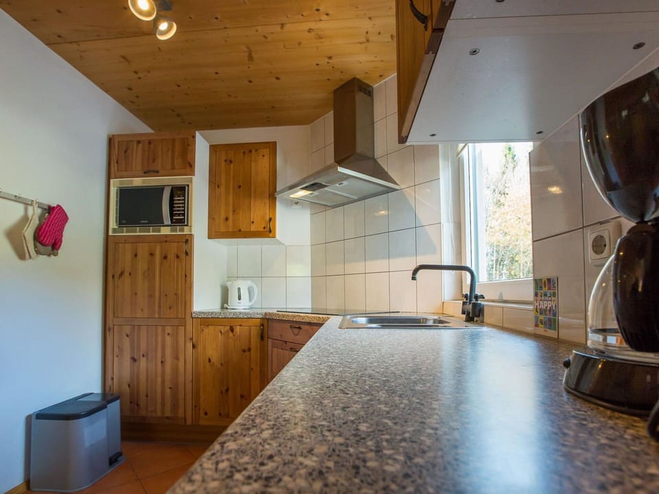 Kitchen, Countertop, Cabinetry, Major Appliance, Flooring, Interior Design, Wood, Kitchen Appliance, Ceiling, Plumbing Fixture