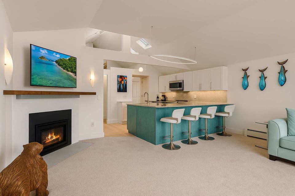 Sophisticated living space with fireplace and coastal vibes