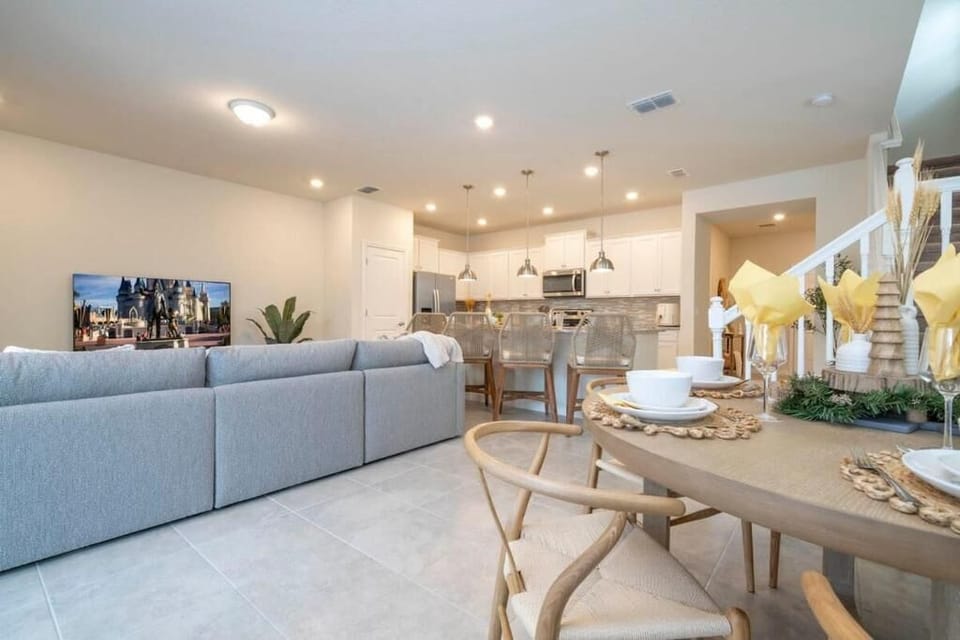 Modern living space with a stylish kitchen and cozy dining area for relaxation.