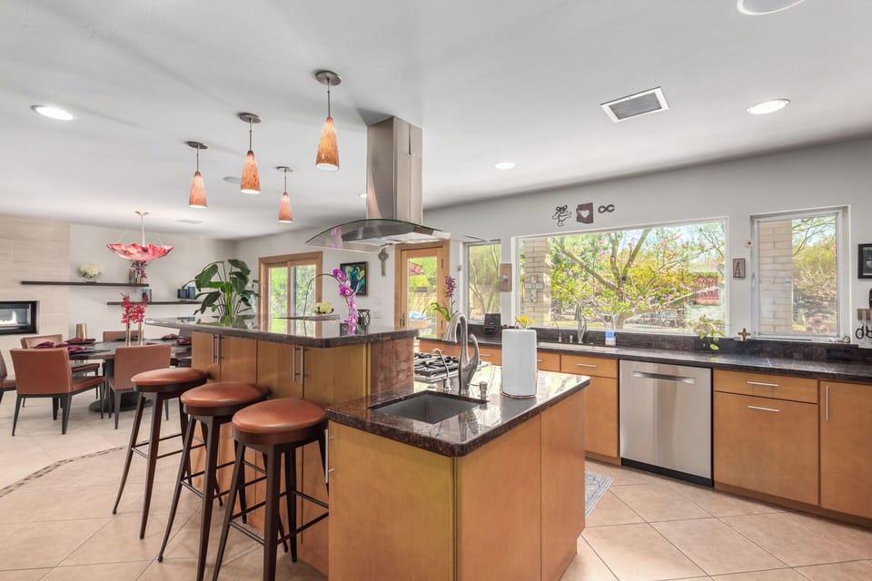 Kitchen with Island and Stainless Steel Appliances
