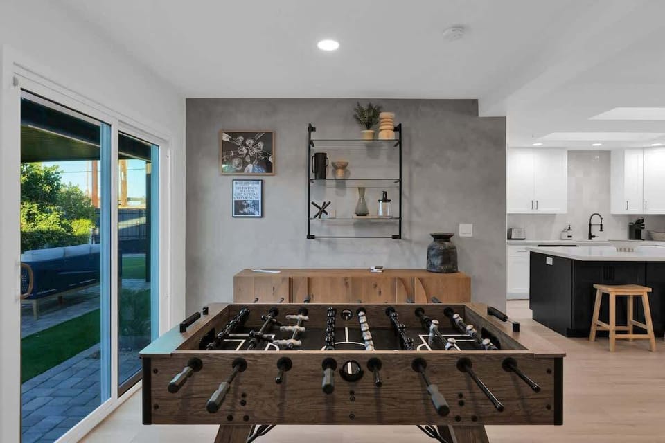 Foosball table and open dining space make entertaining easy and fun