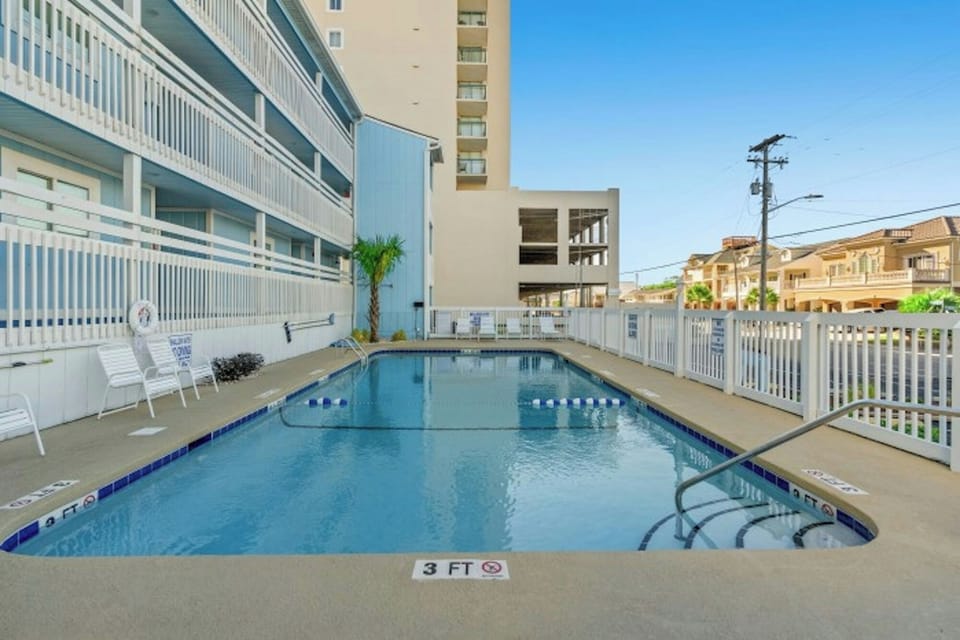 Relax by the pool while the kids splash around.