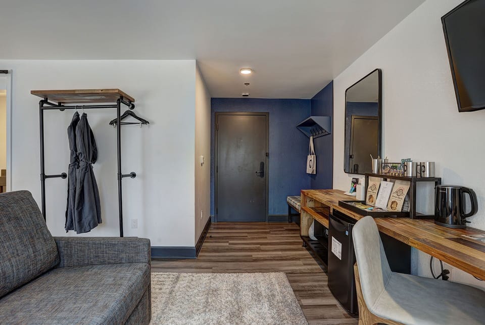 Thoughtfully designed entryway with open storage and modern touches, blending convenience with contemporary charm.
