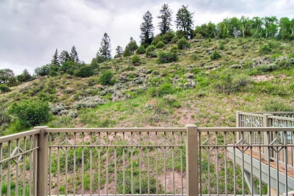 Enjoy reminiscing about your day while sipping a glass of wine outside on the porch.