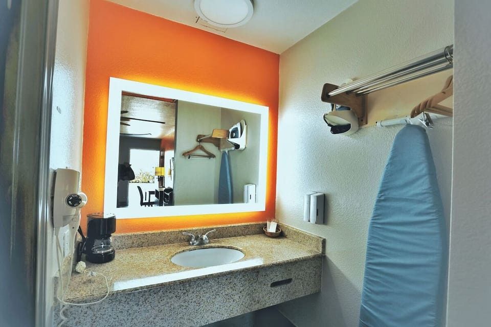 Refresh at the bright vanity with roomy counter space.