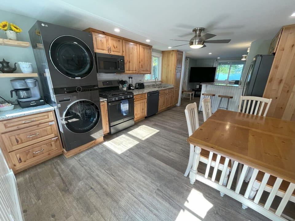 Kitchen has two bar stools for additional seating. Keurig coffee maker as well as drip coffee.