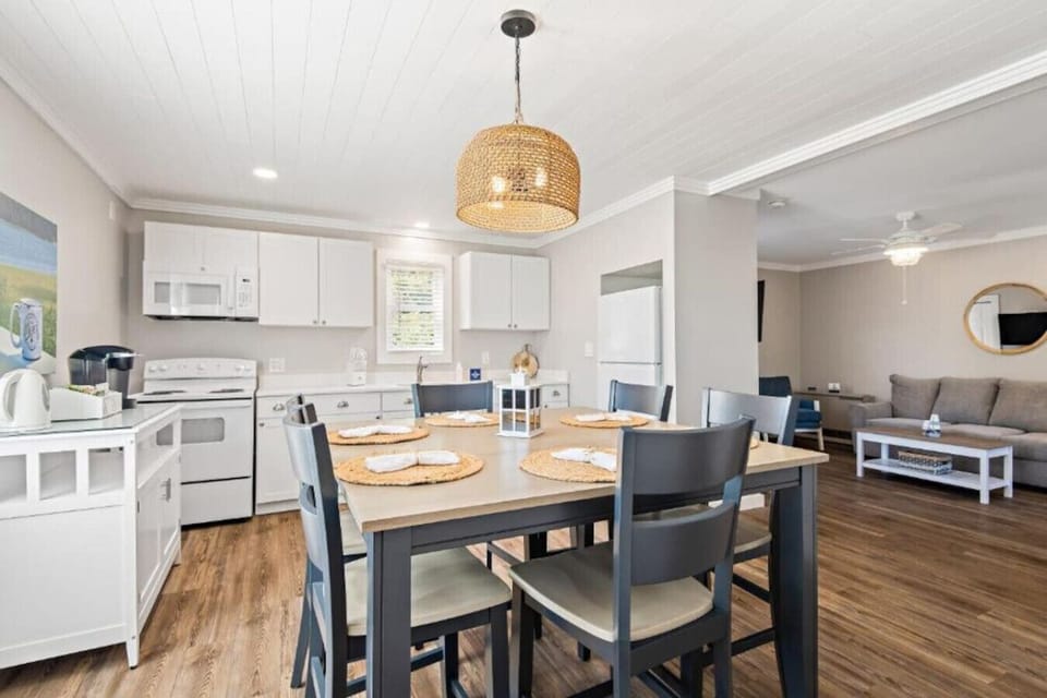 Open concept dining room/kitchen/living room makes the space feel spacious and comfortable. Very well-stocked kitchen with a coffee bar.