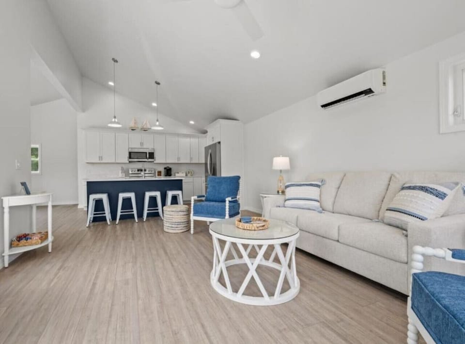 Cottage on the Cove: Open concept living room/kitchen with 4 bar stools for additional seating