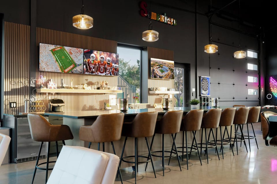 Watch your favorite football team from the 14 ft private bar's TVs!