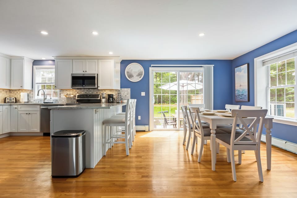 Fully stocked beautiful kitchen and dining room.
