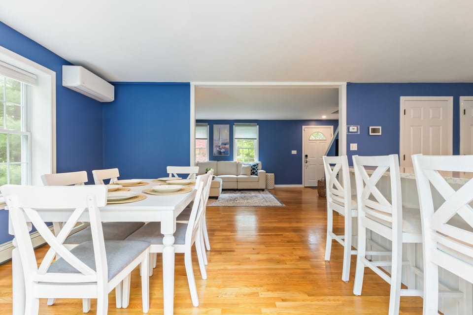 Spacious dining room, kitchen, and living room.
