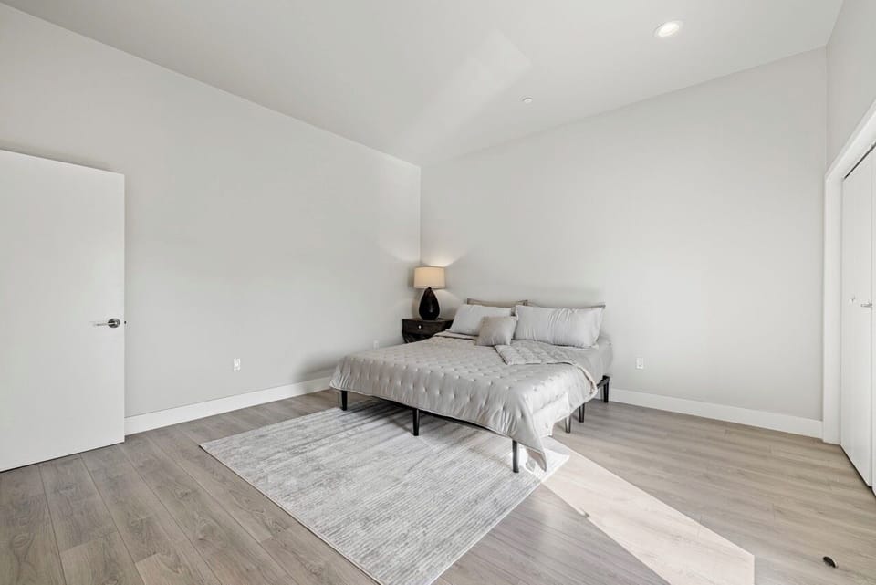 Experience the ultimate luxury and comfort in the master bedroom 