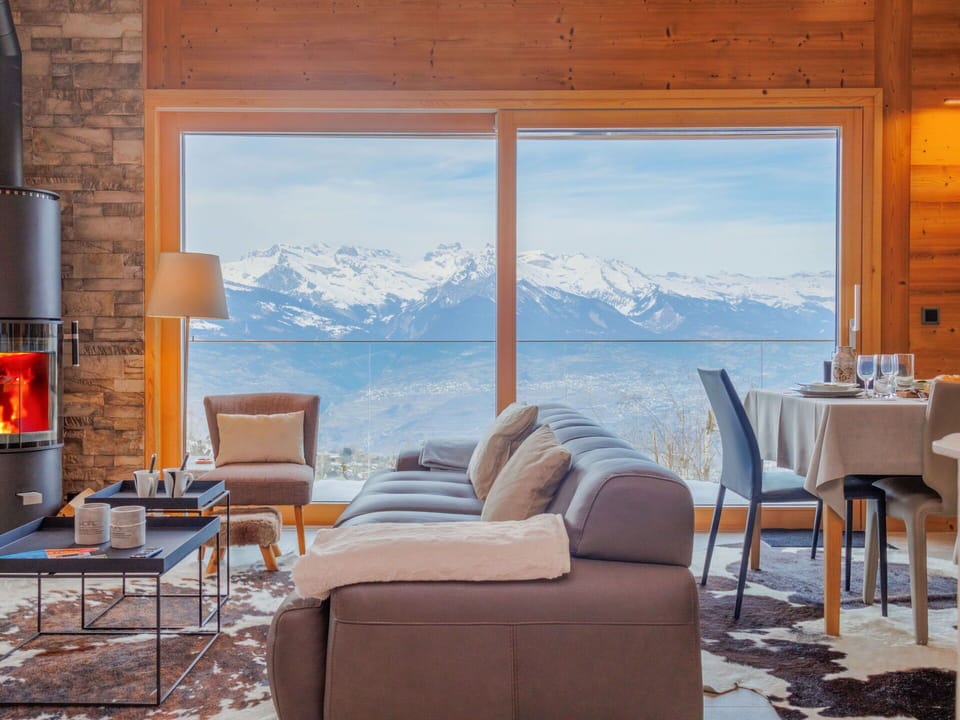 Furniture, Interior Design, Chair, Living Room, Wood Flooring, Couch, Hardwood, Resort, Coffee Table