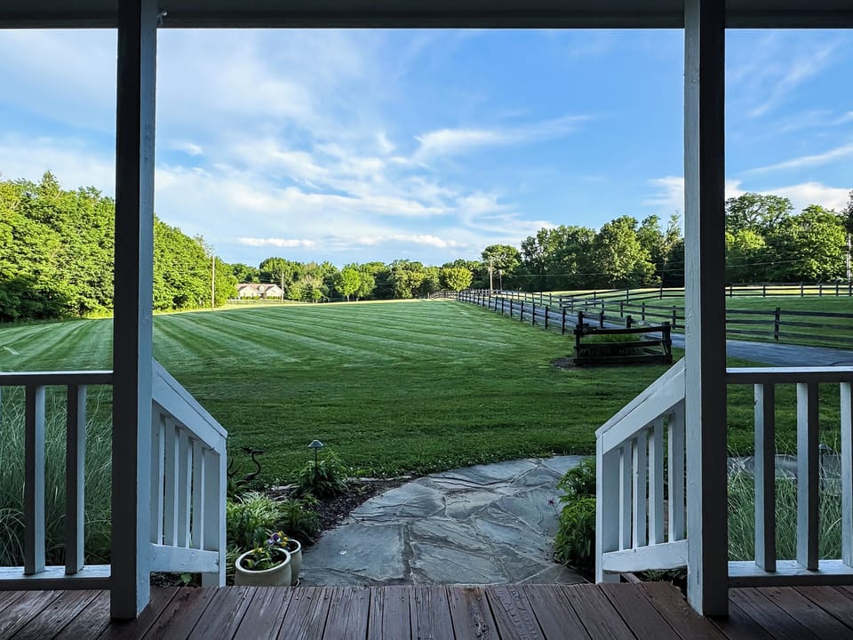 Picturesque views from the gorgeous front porch and large yard for doggies at Pointer Haus.