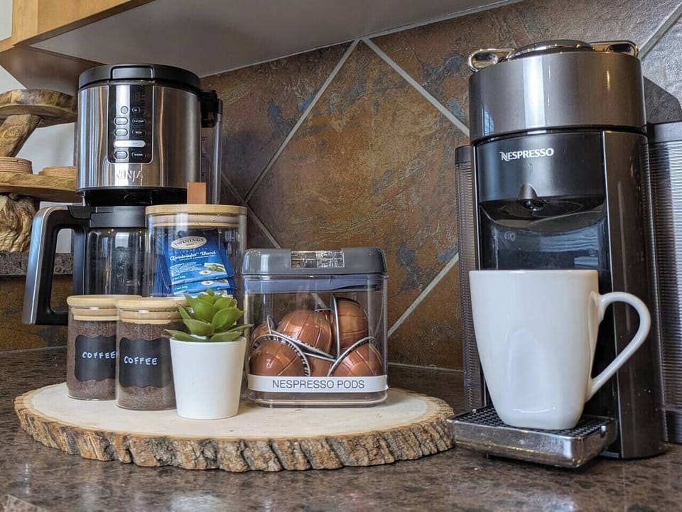 Nespresso and Ninja coffee makers, coffee and tea provided. 