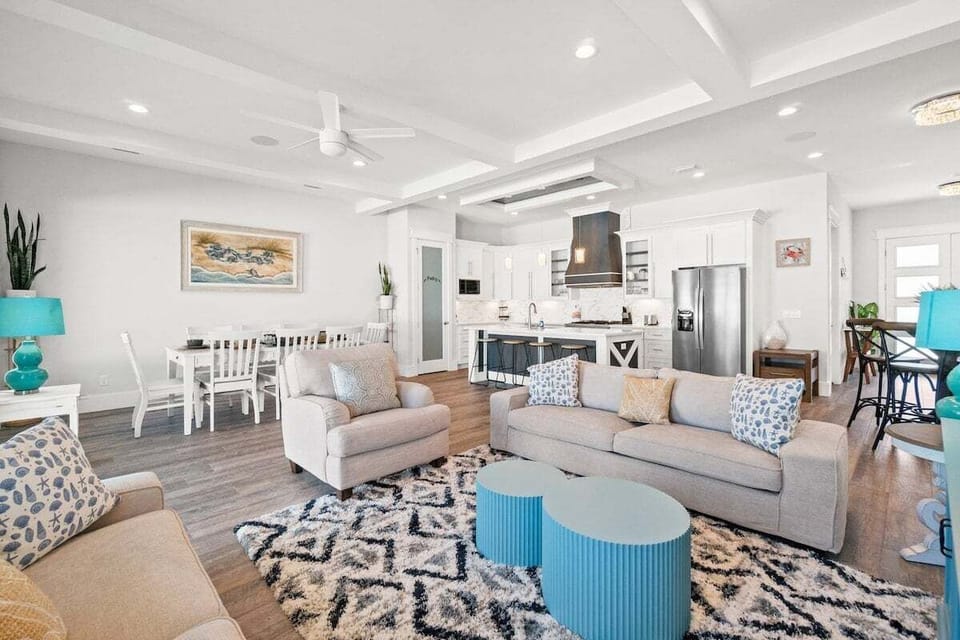 Open concept living room + kitchen + dining area, perfect for entertaining your group!