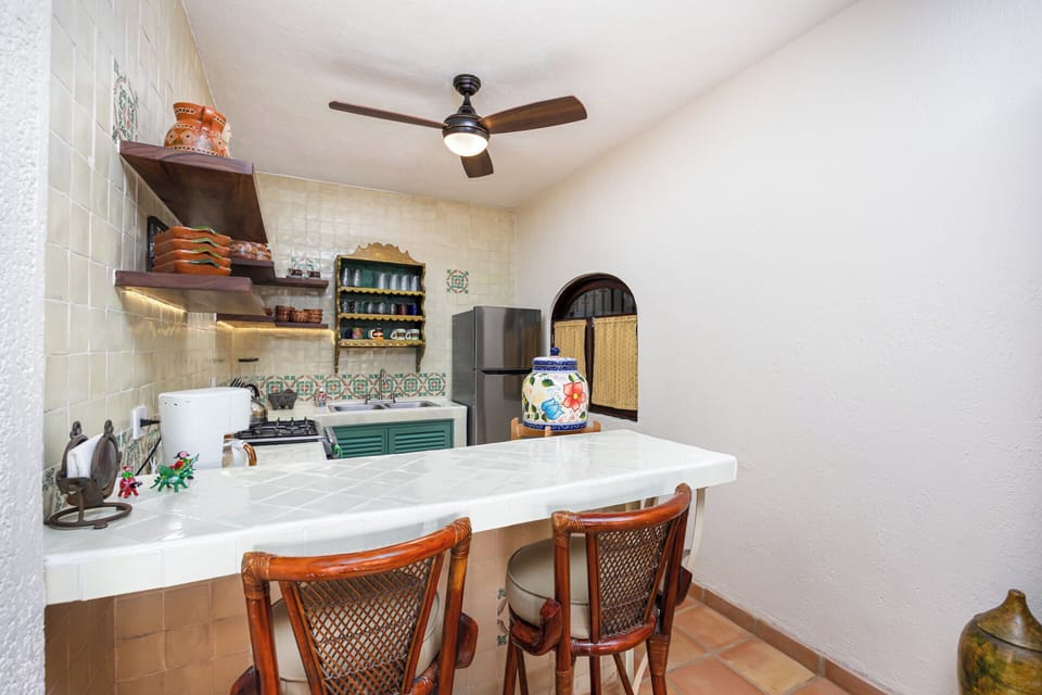 An inviting happy kitchen with Mexican dishes, ambient lighting and bistro vibes