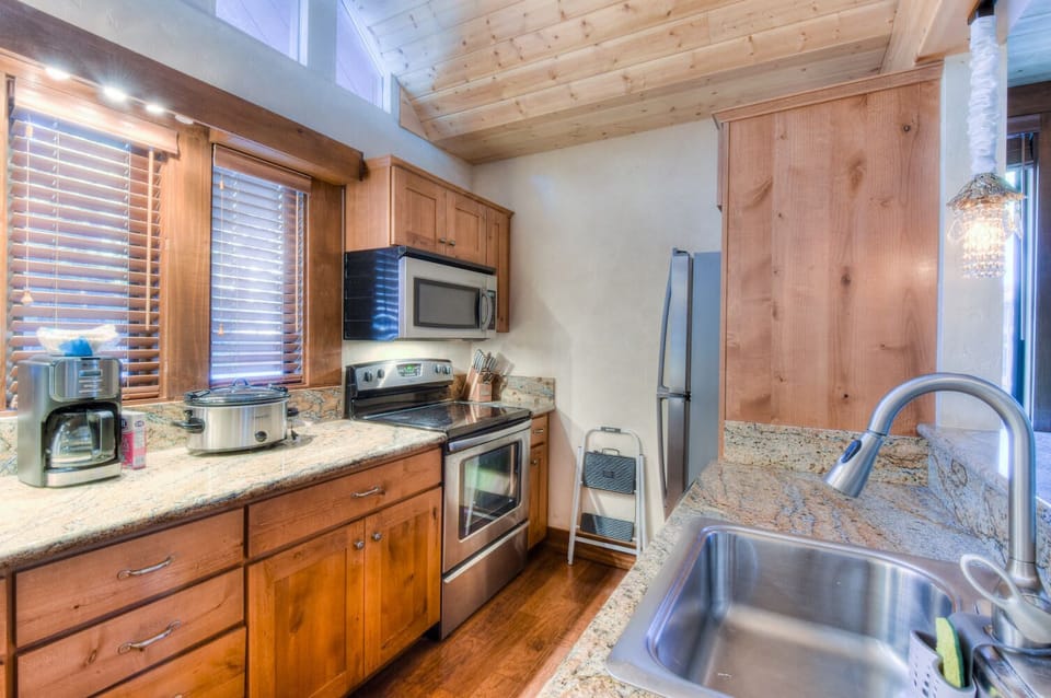 Kitchen w/ toaster oven, drip coffee pot, blender, slow cooker and more