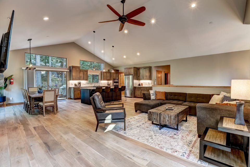 Spacious living space with flat screen TV, fireplace