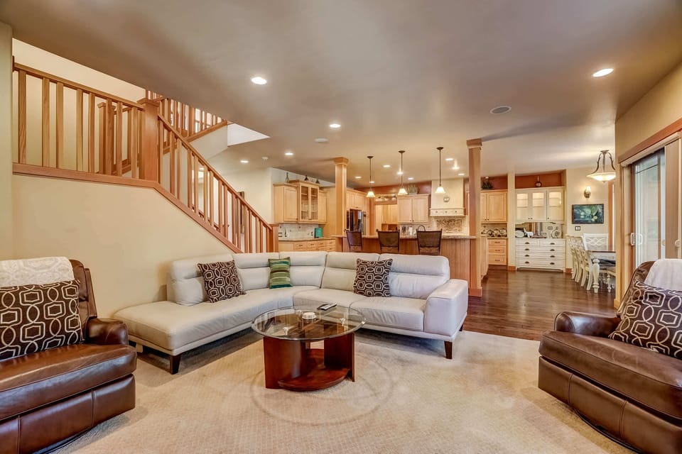 Open living space with gas fireplace, and TV