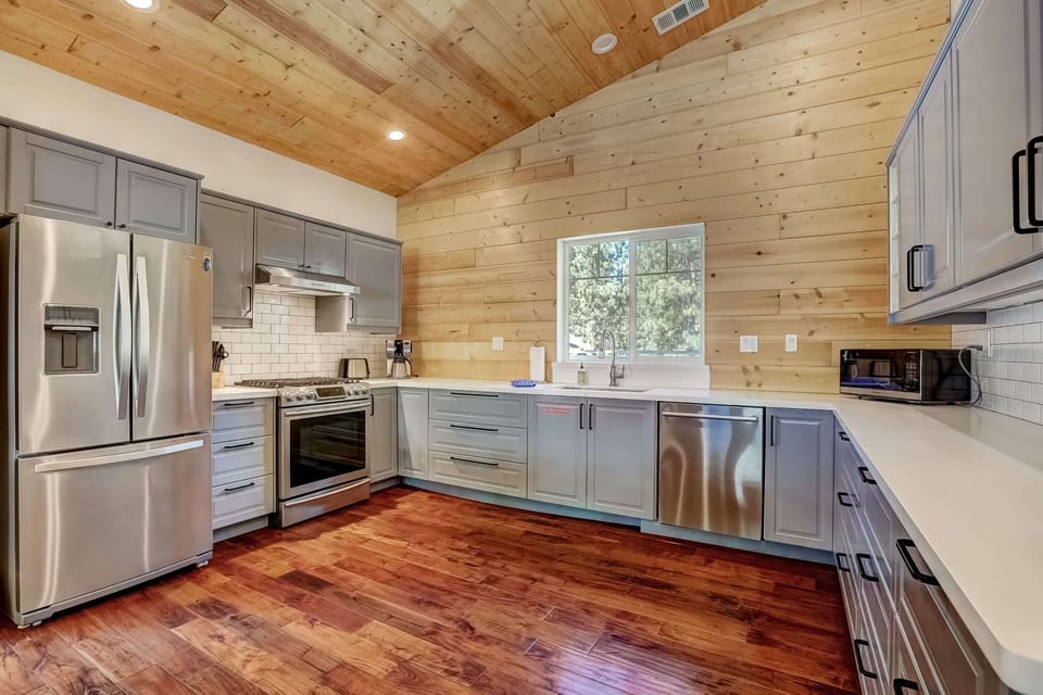 Kitchen with blender, toaster, coffee maker, crock pot, hand mixer and more