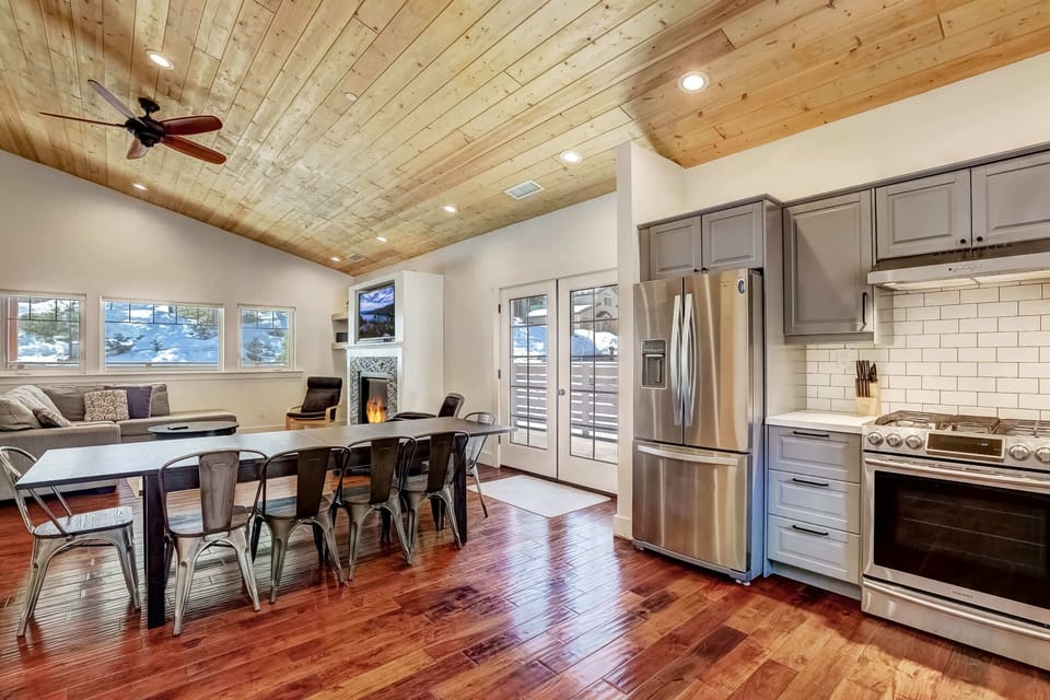 Dining table and kitchen area