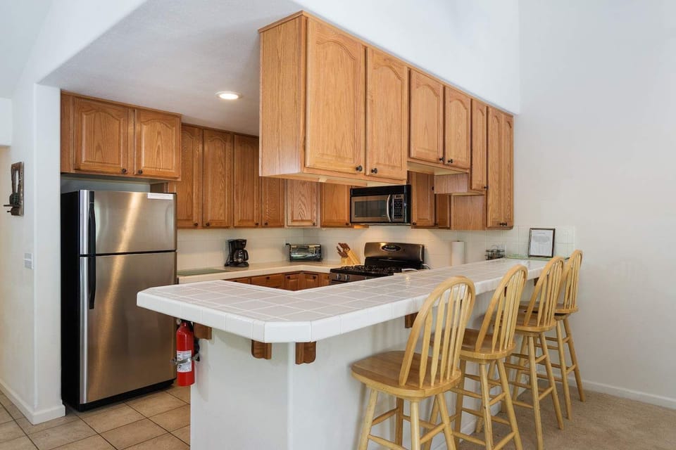 Have home cooked meals with the help of the full kitchen