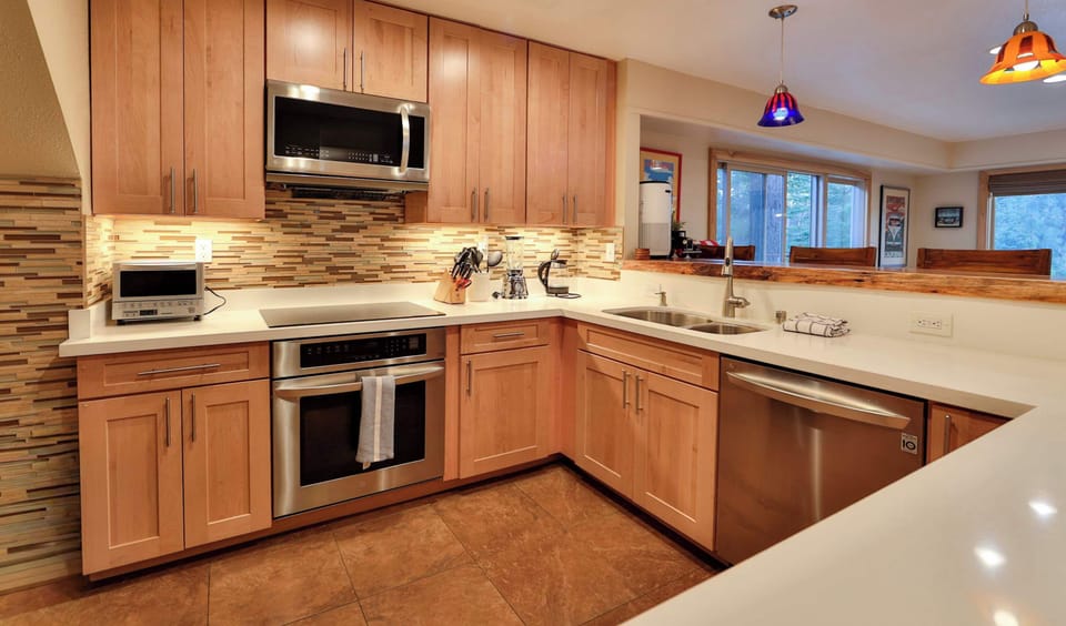 Kitchen with stainless steel appliances and plenty of counter space