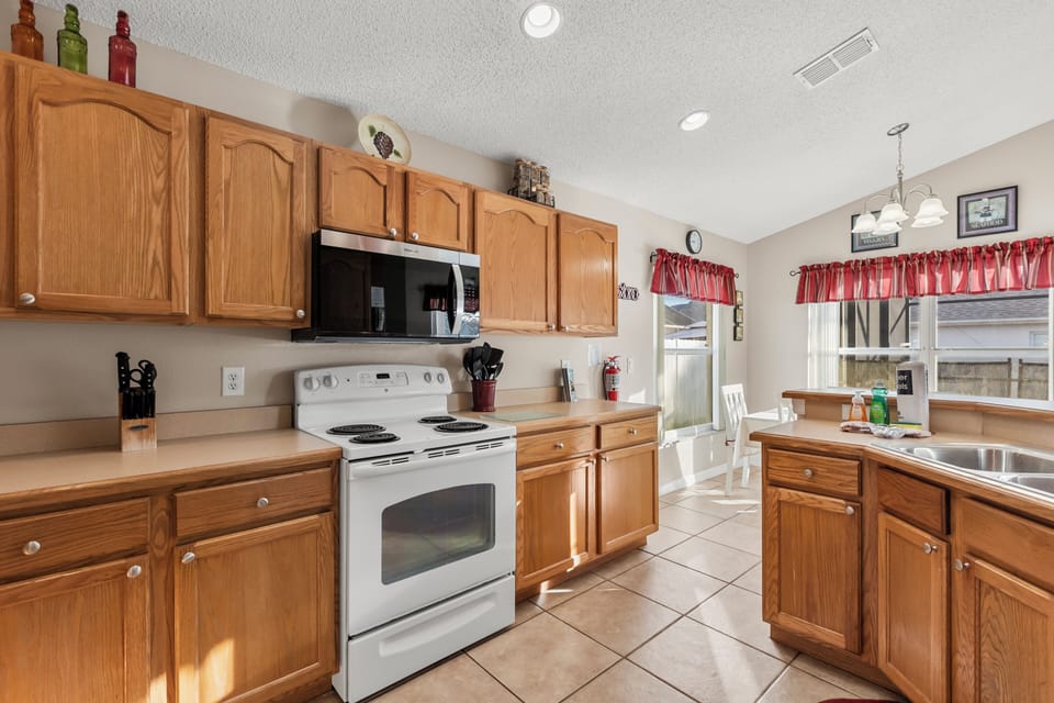 Kitchen Area with Stove and Microwave