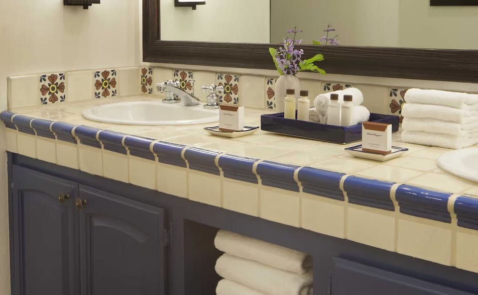 Refresh each morning with spa-like vanity, plush towels, and amenities.