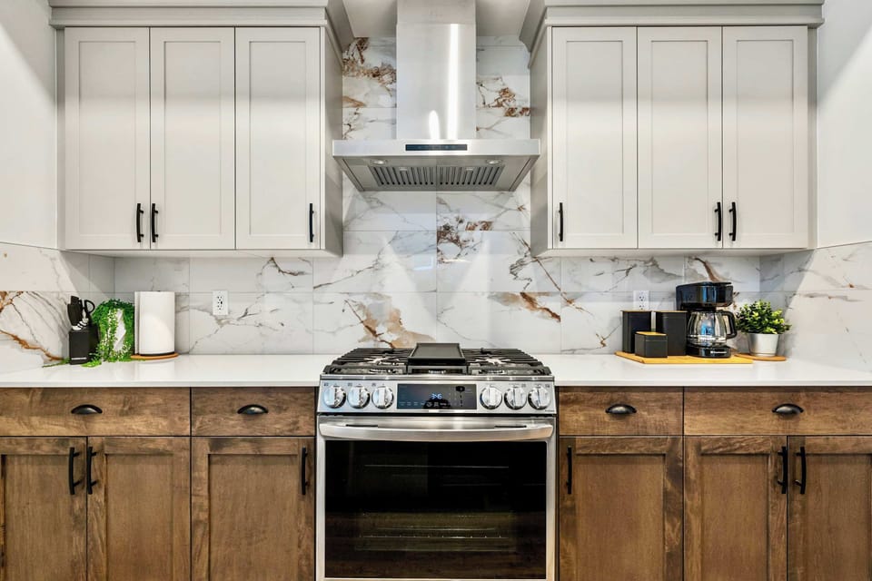 6-burner gas range and statement hood - built for every level of cook.