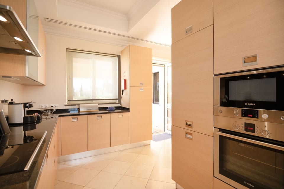 Kitchen leading out to pool area