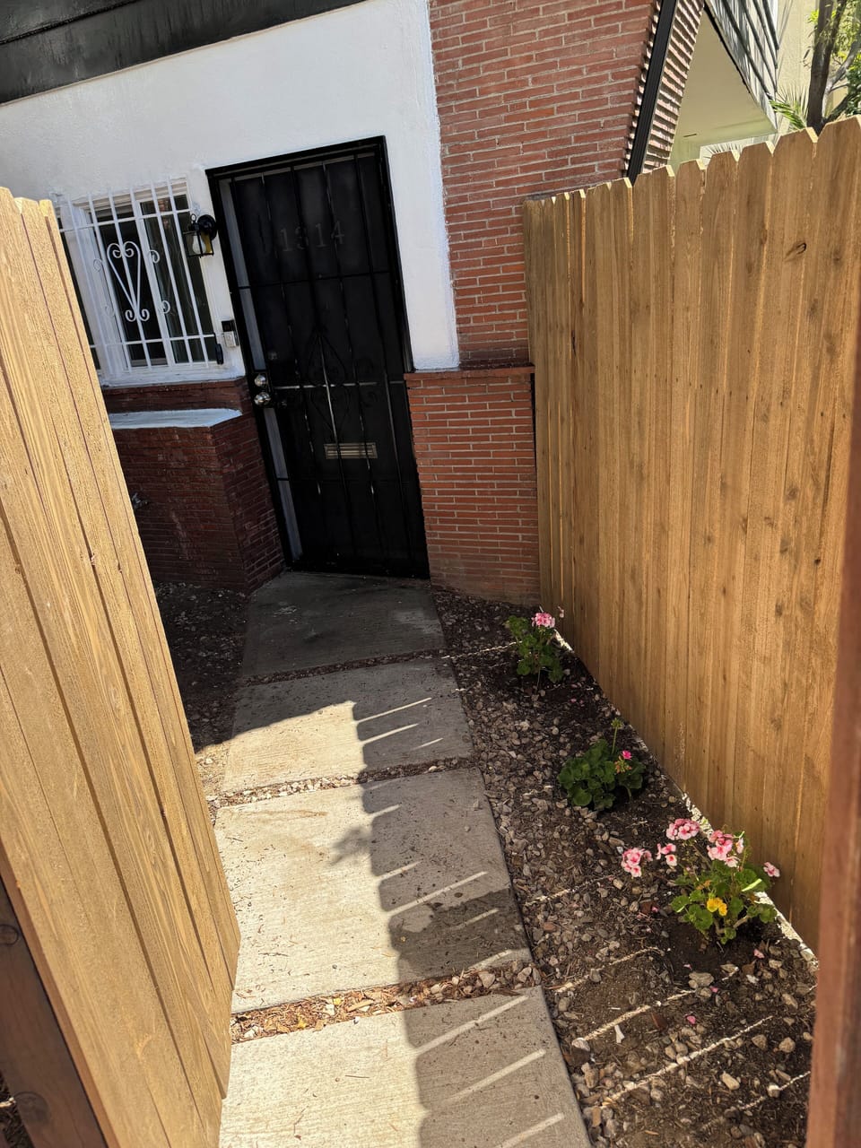 Private gated courtyard. 
No one above or shared walls