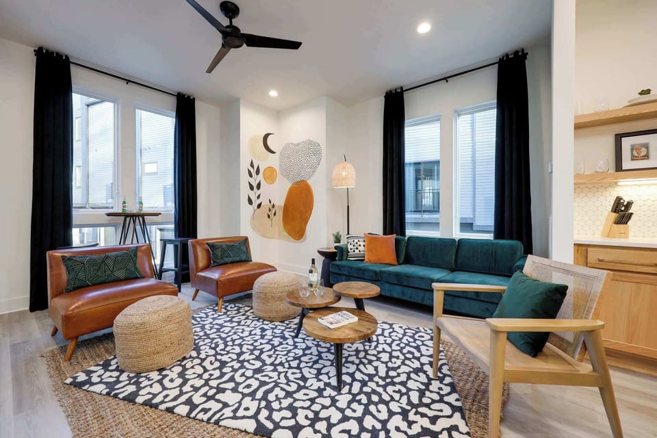 Bright, Clean Living Room with Family Seating & High Top Table