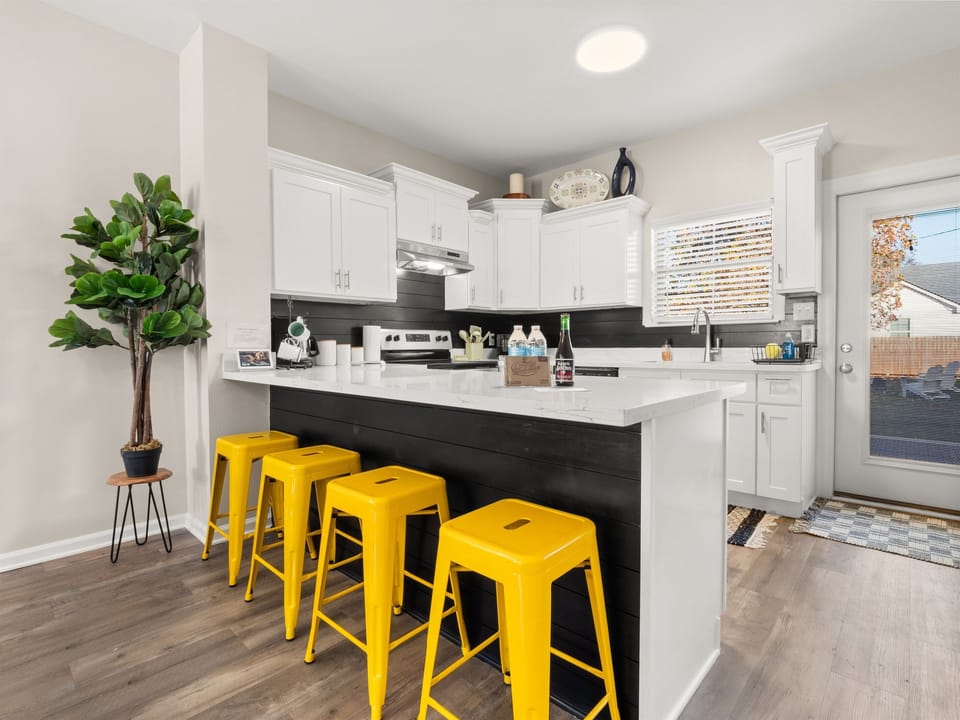 Midnight Moon's breakfast bar in the Kitchen seating for four