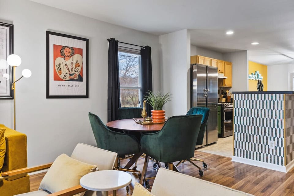 Fully equipped kitchen with all your cooking essentials, drip coffee maker + coffee. Dining table with seating for 4 + additional seating at kitchen counter. This room opens up into the living room, a Pool Table and our backyard patio with BBQ Grill