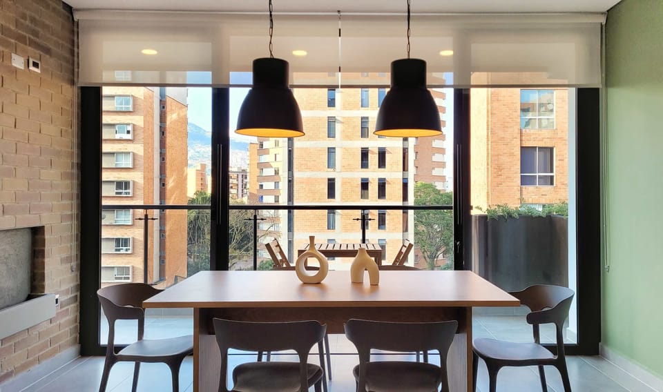 Illuminated Dining Room with Panoramic View