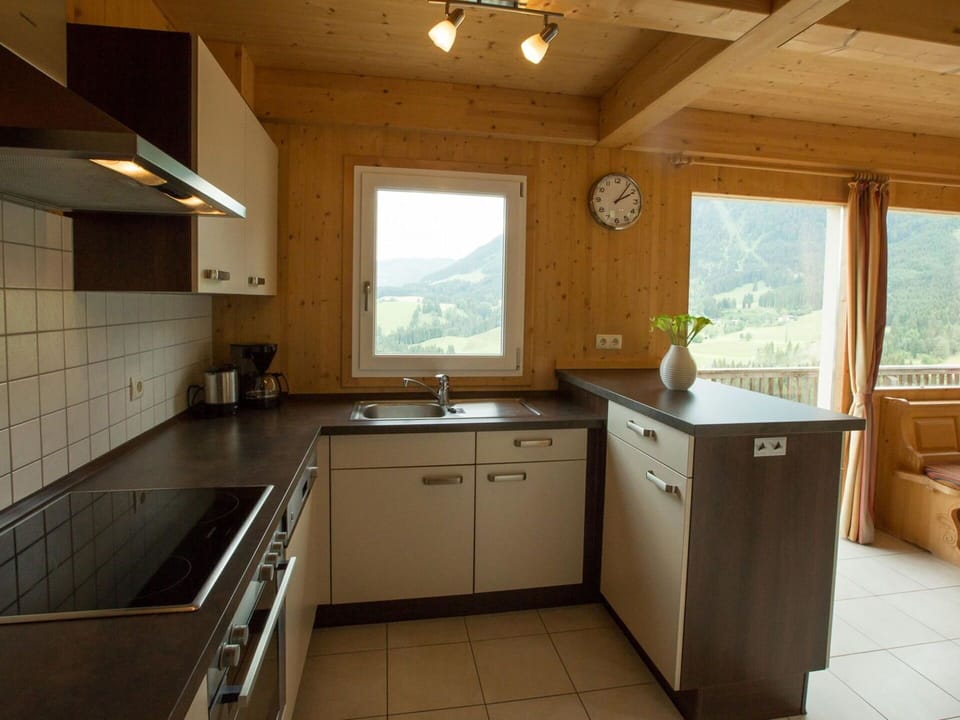 Kitchen, Furniture, Interior Design, Wood, Flooring, Countertop, Cabinetry, Ceiling, Kitchen Appliance, Kitchen & Dining Room Table