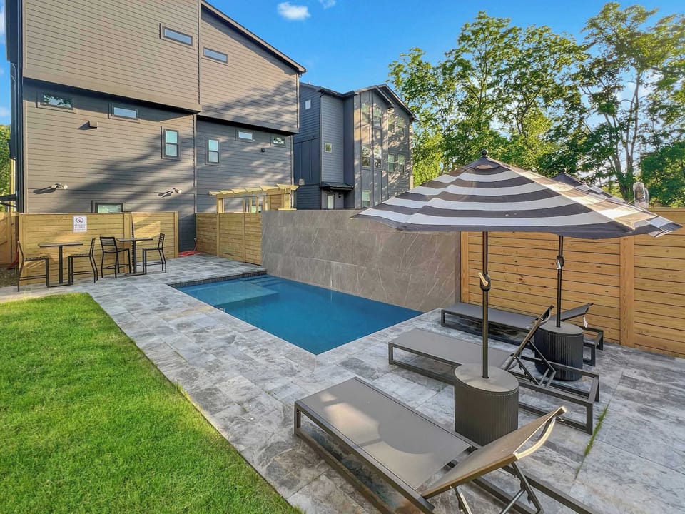 Backyard: Soak up the sun and enjoy a dip in our inviting shared pool area. Backyard and pool is shared with guests staying in the first floor.