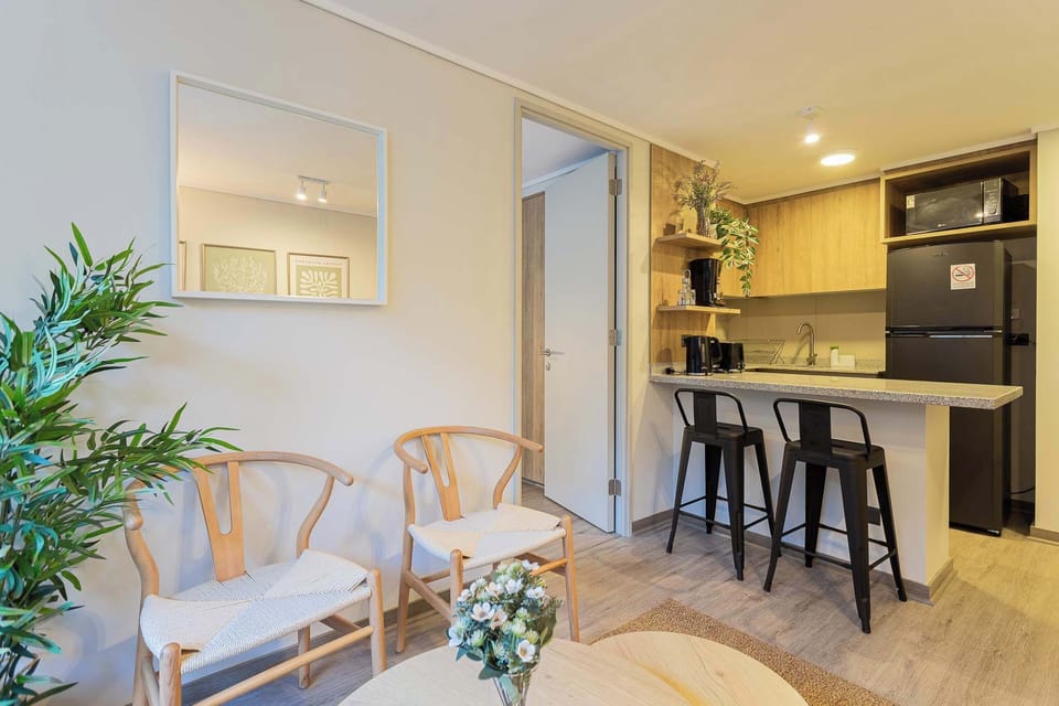 Cozy kitchen area with modern amenities, perfect for quick meals and morning coffee.