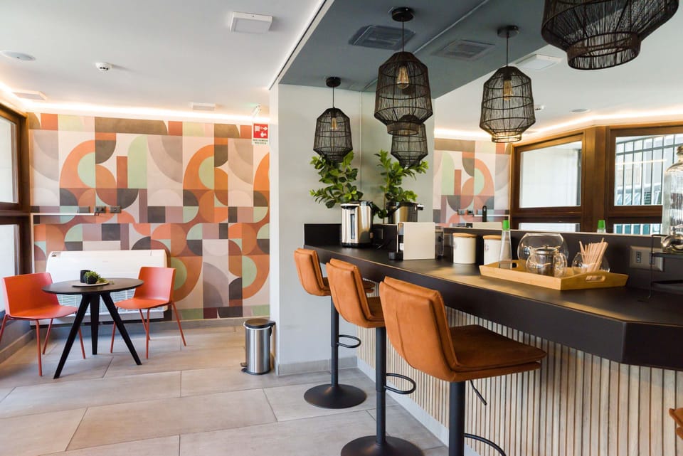 Enjoy a stylish communal area with modern decor and cozy seating, perfect for relaxing or socializing.