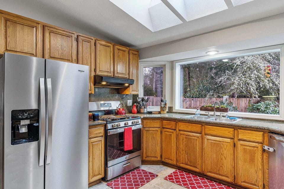 The full-sized refrigerator and freezer complete with filtered water and icemaker round out the kitchen. Our gas stove is ready for cooks to create memorable meals in our well-stocked kitchen.