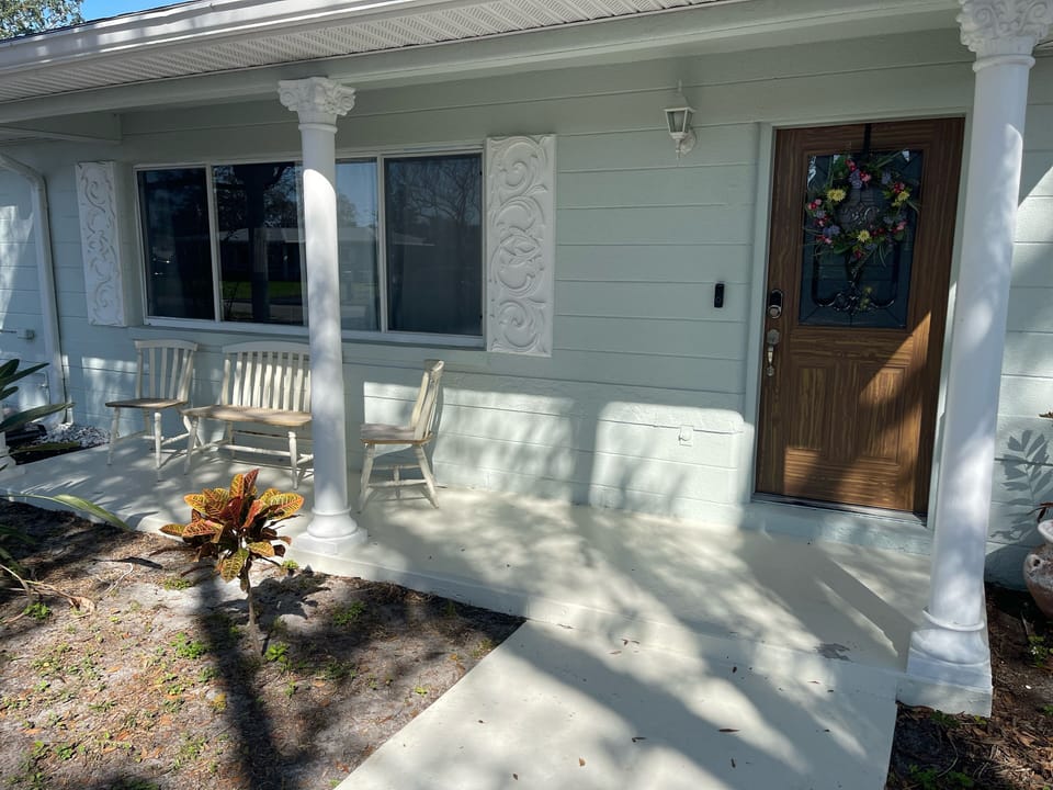 front porch with outdoor seating