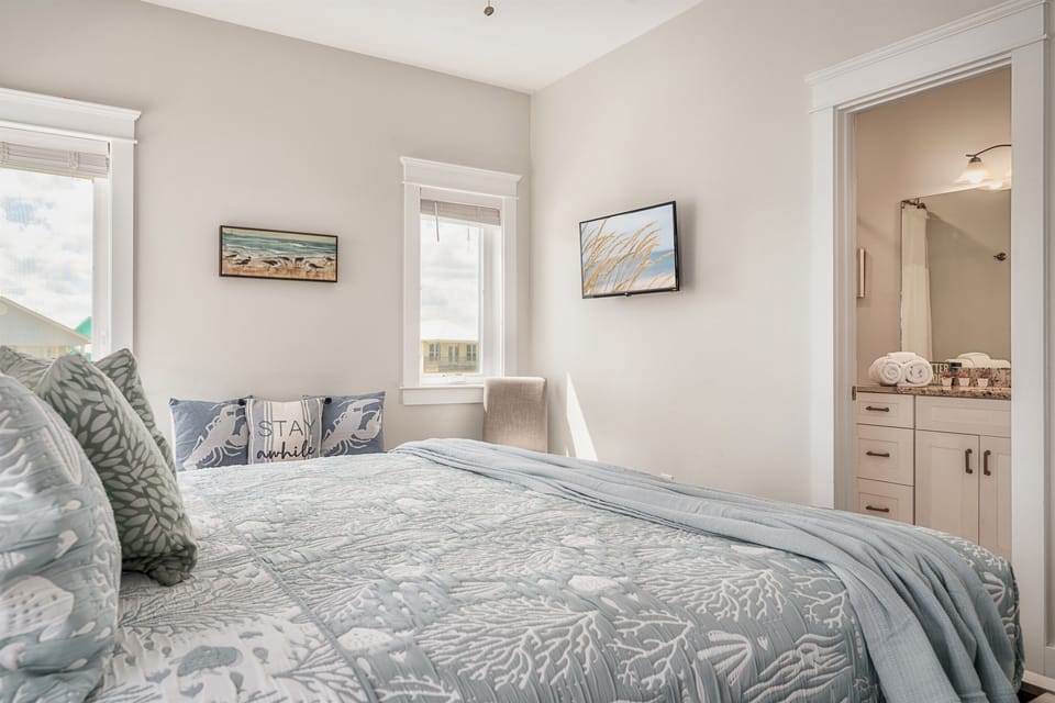 [Bedroom 2] Relax on a King Bed. Enjoy post-beach relaxation with a Roku-enabled TV.