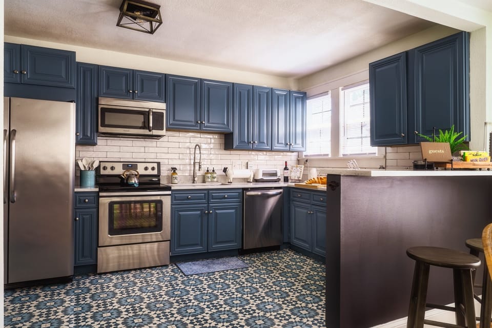 Indulge your inner chef in the fully stocked kitchen of this property, a dream come true with all the tools and equipment you need to create delicious meals during your stay.