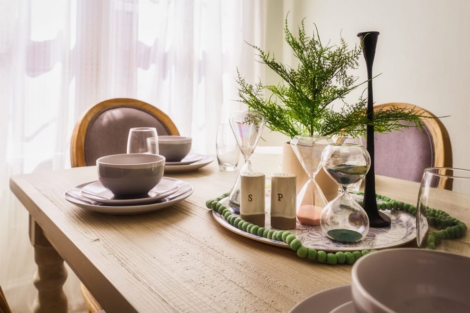 Gather around our inviting dining table and indulge in culinary delights amidst an atmosphere of warmth and elegance.